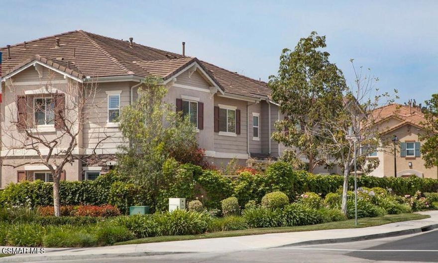 Welcome to this charming end unit townhome in the desirable gated community of Sycamore Shade, where comfort, privacy, and convenience come together beautifully. This spacious 3 bedroom plus loft home offers 1,619 sq ft of well designed living space and is ideally located just a short walk from the community pool and spa, giving you effortless access to relaxation and fun.The kitchen features generous counter space, a deep pantry, and abundant cabinetry, all opening seamlessly to the dining area, perfect for everyday meals or hosting guests. The living room flows effortlessly from the dining area in a true open concept layout, complete with a cozy fireplace and sliding glass doors that lead to a lovely front patio, making this space perfect for entertaining.Upstairs, the oversized primary suite feels like a peaceful retreat with its walk in closet, soaking tub, separate shower, and dual sink vanity. Two additional rooms and a loft provide flexibility for bedrooms, an office, or a play area. A full guest bathroom completes the upper level.Additional highlights include central AC, a downstairs powder room, a convenient downstairs laundry room with extra storage, and an attached two car garage with direct access. The home is also wired for surround sound with built in speakers on both levels, enhancing your entertainment experience. The community offers beautifully maintained grounds, a sparkling pool and spa, and ample guest parking.With close proximity to shops, restaurants, and the freeway, this move in ready townhome is a wonderful opportunity to enjoy the best of Simi Valley living.