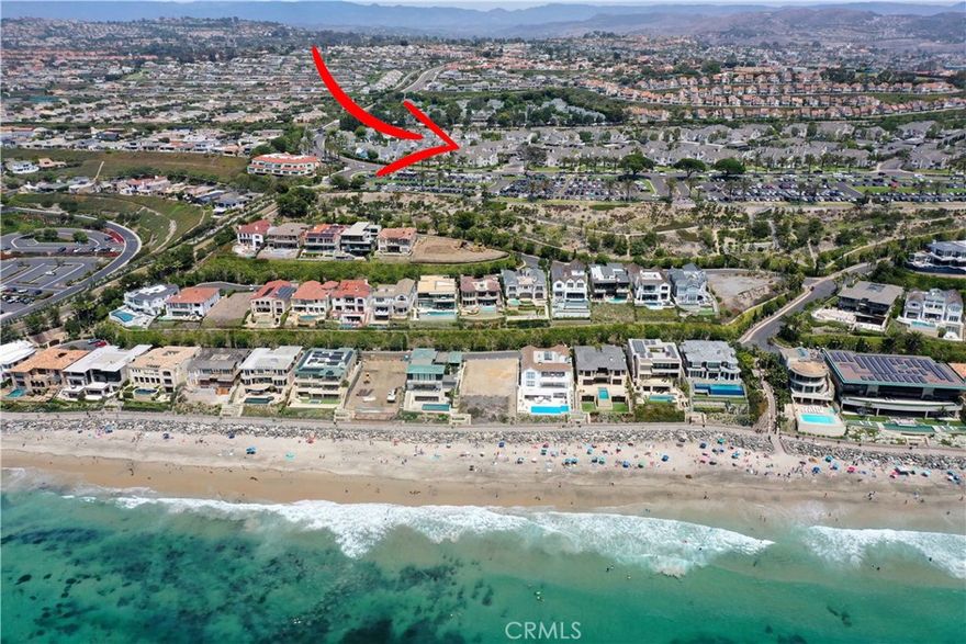 Welcome to your GORGEOUS UPGRADED Dana Point coastal oasis at Niguel Beach Terrace—steps from the sand to Strands Beach & Park! This RARELY ON MARKET, ULTRA DESIRABLE UPPER LEVEL END UNIT is the ultimate beachside gem. Located in one of Dana Point’s most prestigious ocean-side-of-PCH Communities. Soaring vaulted ceilings, no one above, private location within Community - away from the busy beach/public trail/noisy pool & spa. As you step inside you’ll immediately see NO expense was spared—enjoy floor-to-ceiling coastal modern upgrades throughout - open concept layout, extra light, bright & breezy all year-round. With BRAND NEW luxury vinyl plank flooring, fresh interior paint, dual paned windows, recessed lighting, expanded Kitchen with bold black granite countertops, large center island, coastal-modern cabinetry, pull out pot/pan drawers, large pantry, upgraded stainless steel appliances—perfect for entertaining or everyday beach living. Enjoy not just ONE, but TWO large balconies - ideal for dining al fresco, morning coffee & evening ocean breezes. Two oversized bedrooms - upgraded modern closet doors, generous storage space in bedrooms + bathroom + balconies. Two absolutely stunning bathrooms with quartz countertops, designer tilework, sleek & modern. Private laundry conveniently located on balcony. Easy parking with nearby covered carport + plenty of guest parking available. Entire Community recently re-piped all the units with brand new PEX. HOA dues include trash & water + amazing amenities including year-round heated Resort-style pool/spa + second spa, Clubhouse for private events, EV charging stations, greenbelts. All this just steps from World Class beaches, surf spots & scenic walking trails. Explore the famous Headlands Conservation Area, enjoy a short stroll or bike ride to the vibrant Lantern District, dine at some of OC’s best Coastal restaurants. The newly renovated up-and-coming (in progress) Dana Point Harbor & Marina is just down the road—offering whale-watching excursions, Harbor cruises, paddleboarding, fishing, day trips to Catalina Island. Ride the free Dana Point Summer Trolley up & down the Coast, connecting to Laguna Beach’s art scene, San Clemente’s surf spots & San Juan Capistrano’s charming Historic District. Niguel Beach Terrace is the place to be—surrounded by 5-Star Resorts, the Ritz-Carlton, Waldorf Astoria Monarch Beach & the Links Golf Course. Live the ultimate Southern California beach lifestyle year-round ~ Welcome home!