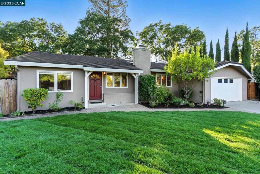 Beautifully updated single story rancher with high-end finishes throughout at the end of a cul-de-sac. Enjoy a spacious layout of over 2200 square feet with two distinct wings, offering both comfort and privacy. The gourmet kitchen boasts granite countertops, stainless steel appliances, a gas range, breakfast bar, and wine fridge, perfect for entertaining. Freshly refinished original hardwood floors flow throughout the main living spaces, including a wood beamed family room leading to the backyard. The expansive primary suite features tall ceilings, a walk-in closet, dedicated office space, and a remodeled spa-like bath. With three full bathrooms, a deck, with solar plus an EV charger and a generous oversized yard of over a quarter of an acre, this home is set in an excellent neighborhood and built for both everyday living and memorable gatherings. Welcome Home!