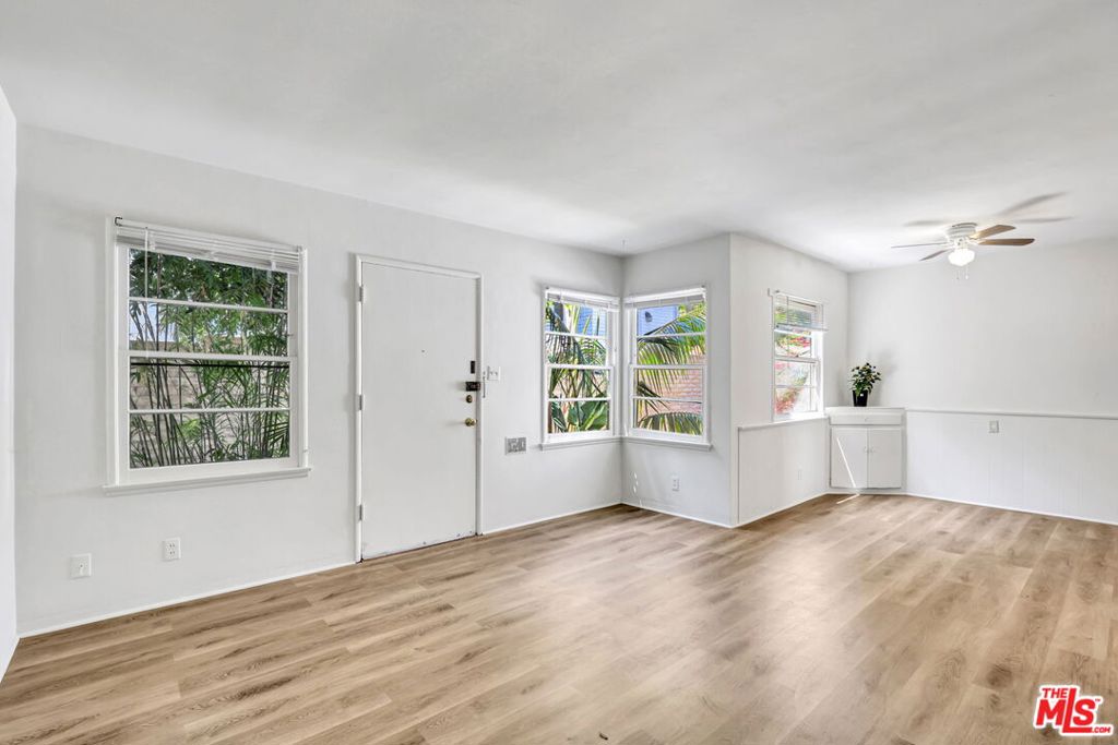 This beautifully renovated 1-bedroom, 1-bath bungalow apartment offers the perfect blend of comfort, privacy, and coastal charm. Bright and spacious, the home features brand-new engineered hardwood floors, updated kitchen and bath cabinetry, and modern appliances throughout. Enjoy your own private patio that is perfect for relaxing or entertaining. Ample closet space and a refreshing ocean breeze that fills the home with natural light. Located on a lush, oversized lot with just four units, each with its own separate entrance. The property feels more like a private retreat than an apartment complex. Don't miss this rare opportunity to live in a serene, bungalow-style home just minutes from the best of Santa Monica. Great walkability in a lovely neighborhood with dining and shopping nearby. Only 1.5 miles to the beach. Easy access to I-10 and bus lines, and within close proximity to Santa Monica College.