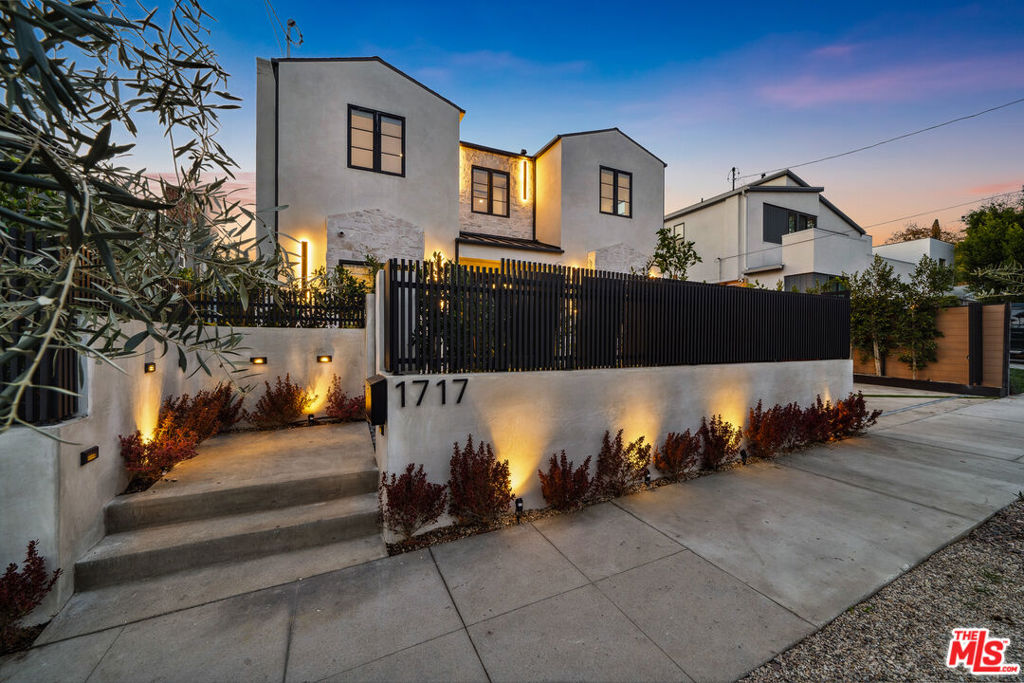 Welcome to luxury redefined in this brand-new, architecturally stunning home nestled in the prestigious Hollywood Hills. Designed with a modern organic aesthetic, this 5-bedrooms 5.5 Bathrooms main house seamlessly blends natural elements with sleek contemporary design, offering an unparalleled living experience.Step into a world of elegance and comfort, where expansive floor-to-ceiling windows, soaring ceilings, and an open-concept layout create a light-filled, airy ambiance. The chef's kitchen is a culinary dream, featuring state-of-the-art appliances, custom cabinetry, and a striking minimalist design. The primary suite is a private sanctuary, complete with a spa-like en-suite bathroom and serene hillside views.But the luxury doesn't stop therethis property also boasts a two-level ADU, perfect for guests, a home office, or rental income potential. The resort-style backyard is an entertainer's paradise, featuring a sparkling infinity pool, outdoor lounge areas, and lush landscaping, all designed for ultimate relaxation and privacy.Located just minutes from the Sunset Strip, world-class dining, and entertainment, this home offers the perfect blend of seclusion and accessibility. A rare opportunity to own a masterpiece in the Hollywood Hills. Welcome Home !