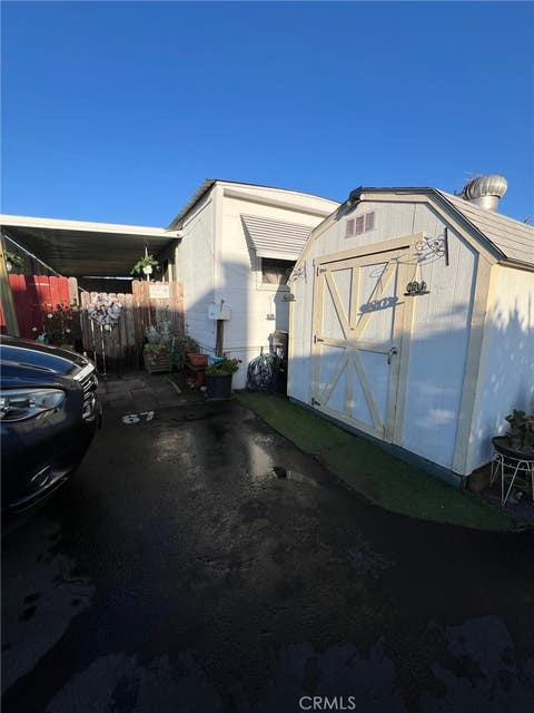 Photo of 402 E Foothill Boulevard #67, Pomona, CA 91767 (MLS # PW26133657)