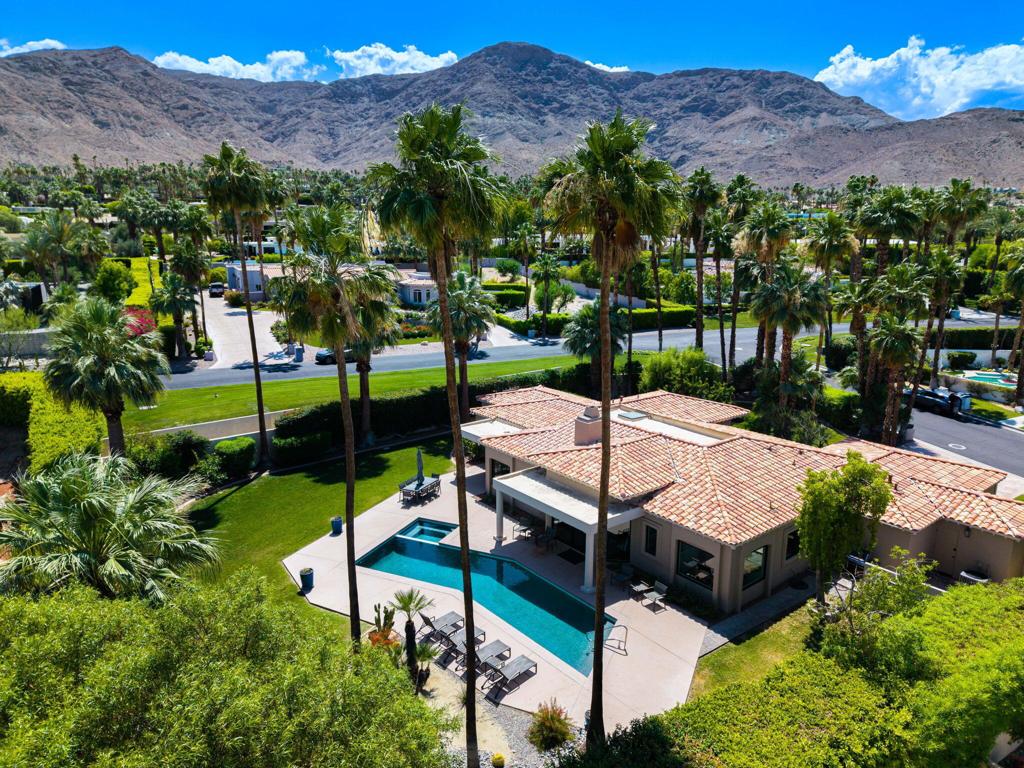 Thunderbird Heights! Possibly one of the best values in prestigious Thunderbird Heights! This beautifully maintained home is set on a private cul-de-sac with breathtaking mountain views. Featuring a spacious layout with vaulted ceilings, new Monumental windows and sliding doors, new blinds, new roof, new pool, hardwood floors, and oversized rooms throughout, this 3-bedroom, 3- bathroom home offers comfort and style.Enjoy seamless indoor-outdoor living with a large backyard, complete with a private pool and spa. The property also includes a two car garage plus a separate golf cart garage for added convenience
