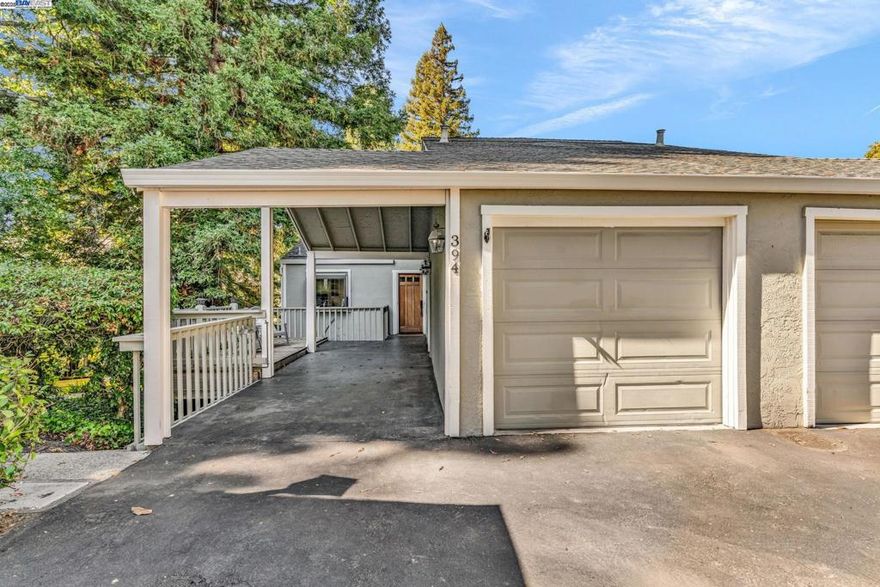 Welcome to 394 Camelback Road, a beautifully updated end-unit townhome offering THE BEST LOCATION in Pleasant Hill’s sought-after Tres Lagos North community. Perfectly positioned overlooking a tranquil lago (lake) w/fountain, this home offers a rare blend of modern comfort & peaceful surroundings. Inside, enjoy 4 bedrooms (including one on main floor with 1/2 bath), granite countertops, white cabinetry, hardwood flooring, recessed lighting, fresh paint throughout & new carpets in bedrooms. Spacious living room features vaulted ceilings & cozy brick gas fireplace, while French doors open to 1 of 3 private decks nestled beneath lush redwoods—perfect for entertaining or relaxing. The primary suite offers privacy w/views, a walk-in closet & spa-like bath w/stall shower & dual sinks. Community amenities include: sparkling pool, clubhouse, tennis/pickleball courts as well as lush, beautiful grounds & walking paths that circle 3 interconnected lakes complete w/fountains, fish, turtles & birds. Conveniently close to shopping, dining, DVC, BART, trails & freeways. Includes attached garage + carport, in-unit laundry. HOA covering water, exterior, roof & landscaping. Enjoy serene views from nearly every room—a rare move-in-ready retreat in the heart of Pleasant Hill. Open 10/11 & 10/12 1-4