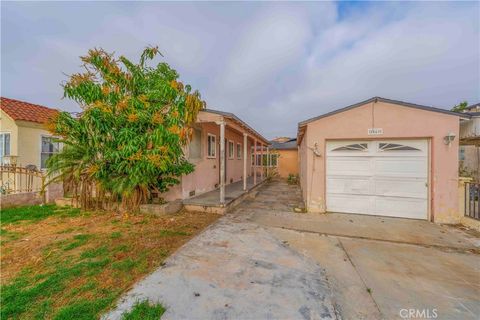 Photo of 8669 San Gabriel Ave, South Gate, CA 90280 (MLS # MB26076985)
