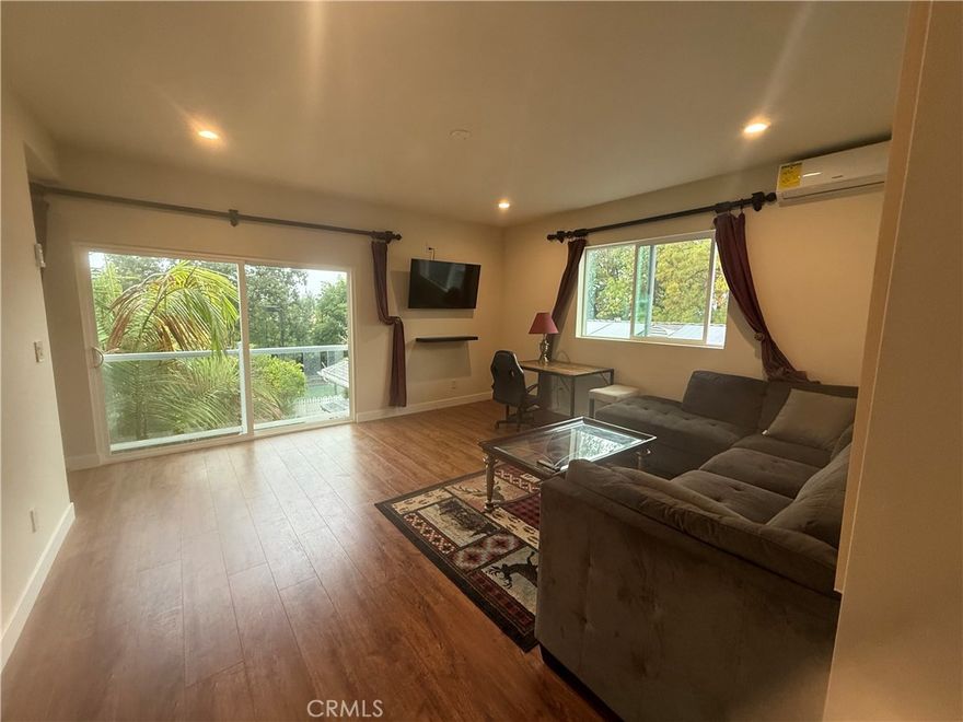Welcome to this fully furnished charming 1 bedf 1.5 bath in the heart of Woodland HILLS. This modern ADU is a two story, with the first floor offering a nice layout of the living room, a kitchen, a dining room area, and a powder room. The second floor is very well lit, with a large area - could be used for recreation and/or home office, as well as one bedroom and a full bath. This unit includes a washer and dryer.

Water, Gas, Garbage, Hot Water, Cold Water, high speed internet, Samsung 26 cu smart refrigerator, 65 inch Samsung Smart TV, Queen bed with a grey head board and foot board with metal base, 14 inch memory foam mattress, coffee maker, toaster, brown wood dinning table with 4 chairs, black leather sofa bed, private patio.

Conveniently located near shopping centers, Bristol Farms, Starbucks, Westfield Shopping Mall, The Village at Woodland Hills, The Commons at Calabasas, and many great restaurant options! Also close to the freeway! Come see us!!
