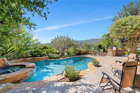 Photo of 25730 Hawthorne Place, Stevenson Ranch, CA 91381 (MLS # SR26104268)