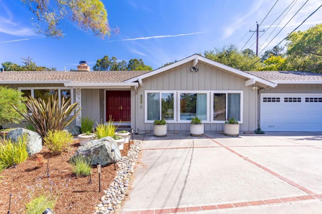 BAYWOOD'S BEST IN CLASS! This home blends timeless charm with modern updates in one of San Mateo's most sought-after neighborhoods, seated on a large oversized lot. Beyond the striking red double doors, a bright living room welcomes you with large windows, a cozy brick fireplace, and elegant cove lighting. This space flows into a formal dining room & a bright, updated kitchen with custom cabinetry, marble countertops, stainless steel appliances, a center island, & a breakfast bar/nook. An open family room offers built-in cabinetry, French doors, & a hidden wet bar. Down the hall, the primary suite features an updated en-suite bath with a frameless glass walk-in shower. Three additional bedrooms include a guest retreat with a half bath. The updated hallway bath has a frameless glass shower with wood-paneled tile accents. Extras include a hallway pantry with a second fridge, a spacious garage with lots of storage space, & a large backyard sanctuary with a paver patio, large deck, covered seating, & garden areas. This home is also close to Highways 92 / 280 / 101, College of San Mateo, Crystal Springs trails, Downtown San Mateo, Crystal Springs Shopping Village, Laurelwood Shopping Ctr, & countless other top-rated public & private schools. Your dream Bay Area lifestyle starts here!