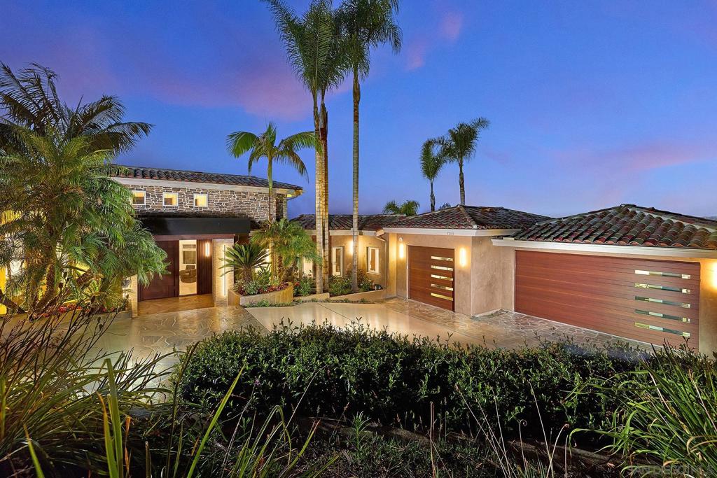 A Tulum-inspired, top-to-bottom remodel w/soaring ocean & Batiquitos Lagoon views. On a leafy one acre lot, Andrade Architects nurtured an earthy-luxe vibe for this 5BR, 5.5 BA renovation combining organic materials w clean lines. Everything is custom: The primary spa experience w/heated floors, walnut cabinetry & the mood-lit foyer for sunset happy hour. Downstairs: Enjoy a media room, guest quarters & a speakeasy. Plus: A newly retiled pool & spa. Private location & close to beaches, dwntwn Leucadia. Architectural Cred: The OC-based Andrade Architects is known for the finest craftsmanship. Here, they enlisted new floors, lighting and new bathrooms for this luxurious renovation. The arrival reflects the level of craft with a custom 10-foot walnut pivot door, opening onto a seaview foyer illuminated with custom wine storage. There’s new custom cabinetry, new fireplace facades and all new tiles and fixtures in the 5.5 bathrooms. The pool and spa sparkle with new tile. The floor plan is designed to connect and disconnect in equal measure. The primary retreat boasts a resort spa experience with heated floors, steam shower & deep soak tub. Outside, there’s a retiled pool and spa with new slipproof decking. Plus: An outdoor area to chill, grill & entertain. Prime Location: Close to the beach, just East of I-5, and near Batiquitos Lagoon, Fox Point Farms, Encinitas Ranch Golf Course, La Costa and Aviara. Private & Secure: Located on a gated property on a cul-de-sac dotted with mature Torrey Pines, this area offers both privacy and access to the North County lifestyle.