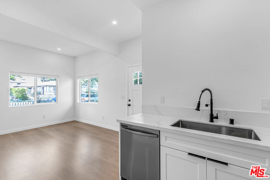 Located in quiet contemporary Santa Monica neighborhood, carefully crafted to suit ultimate comfort, spacious airy new remodeled modern inspired oasis of a home with lots of natural light, "House-style" Modern 2 Bed + 1 Bath + Garage & W/D in-unit, architectural masterpiece. Home features; alluring modern tile, new open modern kitchen with high end custom finishes, hardwood flooring, large custom full kitchen with new stainless steel appliances, quartz stone countertops, large open dining area and living room area. Newly installed recessed lighting throughout, AC and Heat, washer/dryer in unit, and much more. Parking garage included. Prime location, Montana Avenue shopping strip, close to many restaurants, entertainment, Third Street Promenade, Santa Monica Pier, Santa Monica Stairs, the beach, hiking trails in the Santa Monica mountains, and more. Quiet building.