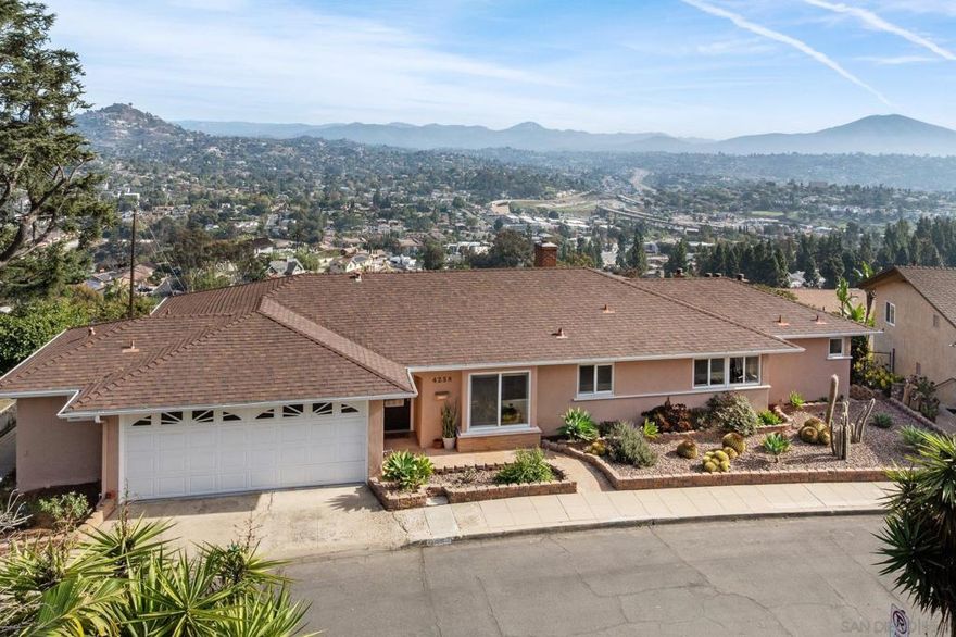 Windsor Hills single level NO STAIRS beauty with unobstructed views of the San Diego mountain range to the city below. Once inside, you’re met with an awe-inspiring picturesque view of Mt. Helix, Mt. Miguel, all the way to the lights of Mexico. Large picture windows and sliding glass doors open to your full-length private viewing deck whereas just below lies a large fully fenced backyard filled with fruit trees, a huge patio, and a side yard destined to become your private playground. A minutes walk or drive to the quaint Village of La Mesa to enjoy local shops, dining, entertainment and transportation. San Diego beaches, mountains and Airport are an approximate 20-minute drive. Located on a cul-de-sac street with little traffic, this simplified open concept room to grow home awaits your return after a full day of San Diego County living. Enjoy life and see yourself "Atop the Summit"  Windsor Hills single level NO STAIRS beauty with unobstructed views of the San Diego mountain range to the city below. Once inside, you’re met with an awe-inspiring picturesque view of Mt. Helix, Mt. Miguel, all the way to the lights of Mexico. Large picture windows and sliding glass doors open to your full-length private viewing deck whereas just below lies a large fully fenced backyard filled with fruit trees, a huge patio, and a side yard destined to become your private playground. A minutes walk or drive to the quaint Village of La Mesa to enjoy local shops, dining, entertainment and transportation. San Diego beaches, mountains and Airport are an approximate 20-minute drive. Located on a cul-de-sac street with little traffic, this simplified open concept room to grow home awaits your return after a full day of San Diego County living. Enjoy life and see yourself "Atop the Summit"