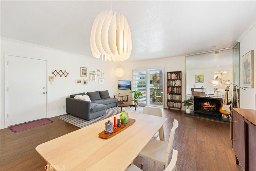 Welcome to 1354 Shadow Lane #202, a beautiful 2-bedroom, 2-bathroom home in the Fullerton hills offering 1,350 square feet of living space all on one level - with the added bonus of the HOA dues covering water and trash! With no units above and only one shared wall, this light and bright home features an open-concept floor plan, highlighted by upgrades including wood flooring and plantation shutters throughout. The expansive Great Room includes a cozy fireplace, balcony access, and a convenient pass-through to the large kitchen, which boasts an eat-in nook and plenty of counter space. The private balcony off the Great Room provides serene hillside views, perfect for relaxing and enjoying the scenery. Both bedrooms are generously sized with full-wall closets, almost like dual primary suites. The Primary Suite offers tranquil hillside views, an ensuite bathroom, and ample closet space. Additional features include a private dedicated laundry room with side-by-side washer and dryer, multiple linen closets, a spacious hall bathroom with a tub shower combo, gated parking and storage, and access to Shadow Lane’s private amenities, including a tennis court, pool, spa, gym, and multiple fruit trees including lemon and persimmon. 1354 Shadow Lane #202 is also ideally located within the award-winning Fullerton school district, and assigned to highly sought after Beechwood Elementary, walking distance to the historic 38 acre Hillcrest Park, as well as shopping and dining in Downtown Fullerton. Call to book your tour today!