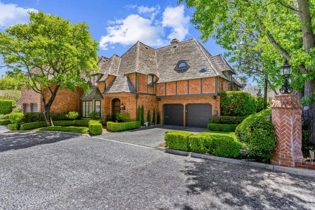 Rare gem in the heart of Los Gatos. Welcome to Place D'Anderegg, a private, cobblestone cul-de-sac of just 5 homes showcasing Cotswold-inspired English charm & storybook architecture. With cloaked brick exteriors, thatched-style rooflines, & manicured landscaping, this residence is a timeless design in one of Los Gatos' most distinctive enclaves. Inside the permitted remodeled first floor is designed for modern living & entertaining. The kitchen is the centerpiece, seamlessly connecting to living & dining areas, with a flexible dining/office/workout space tucked within. Upstairs, an impressive primary suite, two additional bedrooms, & a family bathroom await, while a stylish powder room serves the main floor. And above, a spacious floored attic with high beams offers exciting potential. Comfort & convenience come standard, with dual control heat/ air conditioning, in-home laundry, 2 car garage, 2 car driveway, ample storage and natural light throughout. The brick-lined outdoor space offers a peaceful, low-maintenance retreat, perfect for quiet mornings or relaxed entertaining. A sparkling community pool is steps away. A quiet neighborhood just minutes from downtown's shops, restaurants, & commuter shuttles to tech companies, offering tranquility & connection in equal measure.
