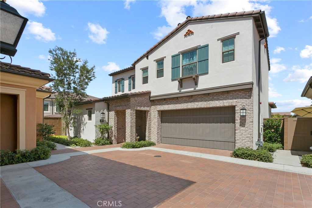 Great home located in Eastwood Community of Irvine. It features 4 bedrooms and 3 full baths. One bedroom with a full bath is on the main floor. Large kitchen with stainless steel appliances and granite counter-tops. The master bedroom includes a private bathroom with dual vanity, large walk-in closet. Downstairs laundry room. 2-car garage attached. Award Winning Irvine Unified Schools. Close to shopping, restaurants and freeways. MUST SEE! ***This is the 12-month lease term price***
