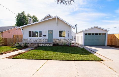 Photo of 1100 E Tichenor Street, Compton, CA 90221 (MLS # DW26037680)