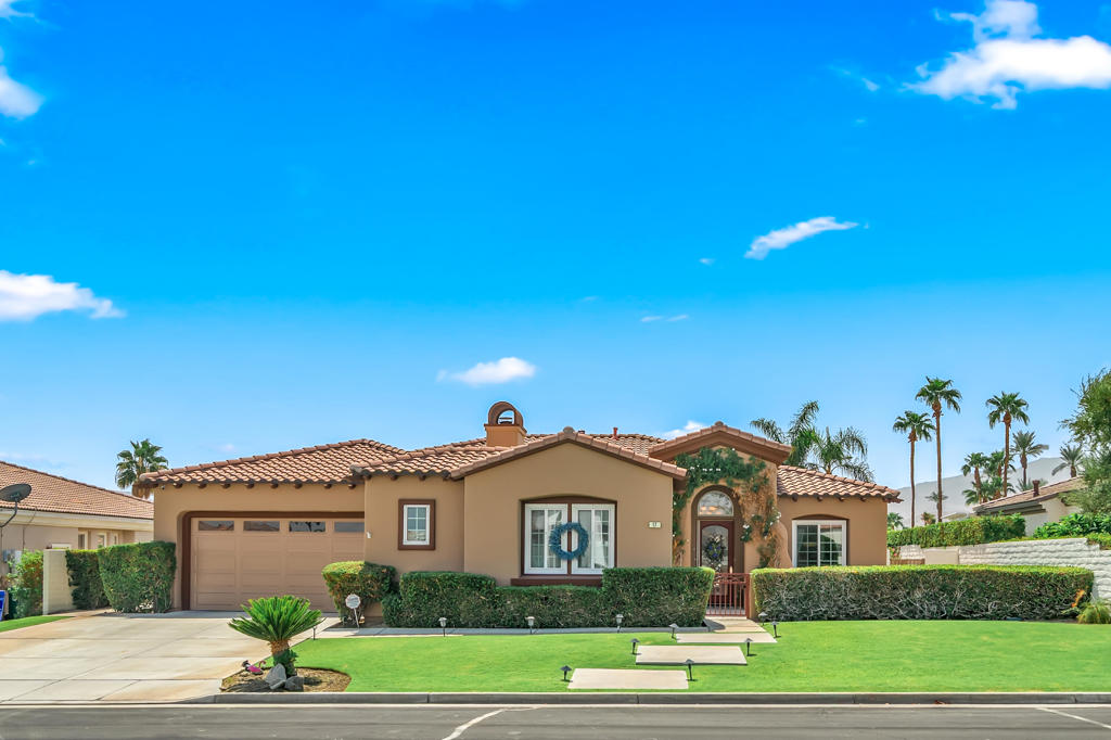 Welcome to this beautiful home in Rancho Mirage's prestigious La Terraza community. This single-story residence offers three spacious bedrooms, three bathrooms, and breathtaking mountain views. The centerpiece is a gourmet kitchen that opens into a great room with a fireplace, featuring elegant cabinetry and ample counter space for daily meals and entertaining. The primary bedroom includes a large walk-in closet and a luxurious en-suite bathroom, while additional bedrooms are designed for comfort and privacy. The home is well-appointed with a freshly painted exterior, solar system, new custom windows, a security system, automatic blinds, and a resurfaced saltwater pool. It also offers a 3-car garage with dual AC units. One of the garage bays has been thoughtfully converted into a light-filled craft/art studio, with the potential to be transformed into a casita for guests or extended family. Step outside to an oversized backyard designed for relaxation and entertaining, complete with a sparkling pool, spa, lush landscaping, and panoramic mountain views. Situated on a quiet cul-de-sac, this home offers both seclusion and convenience, just minutes from El Paseo shopping, fine dining, and Eisenhower Medical Center. Don't miss your chance to own a remarkable home in one of Rancho Mirage's most desirable communities.