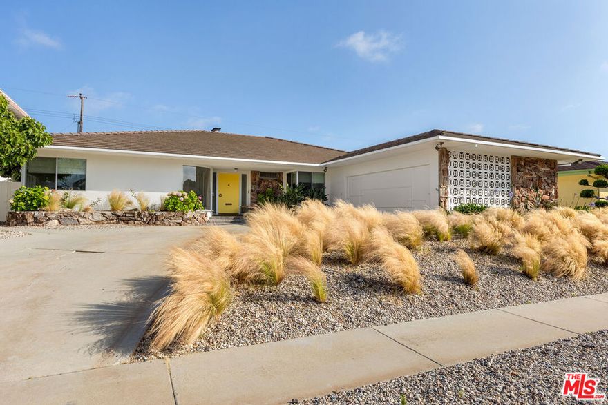 Mid-Century Modern meets Palm Springs. The perfect blend of remodeled space, recently redesigned layout with a touch of desert modern mixed in. This home's thoughtfully imagined original Mid-Century layout features a superb floor plan with living/dining/kitchen in the center of the house facing the sunny well balanced outdoor spaces flanked by a family wing and a guest/utility room wing on the opposite side of the home.  Open Plan Living includes a well appointed formal living room & formal dining room that share side by side opposing fireplaces, a superbly appointed new modern kitchen with architectural ply "drawer in drawer" cabinetry, 1/2 inch square-edge countertops, stainless steel appliances, and casual built-in dining.  The public rooms are seamlessly connected to the balanced outdoors where you find a new Salt Water Pool w/Baja Shelf and child-safe auto-cover, an outdoor patio for entertaining or a quiet reprieve from the city, and a grassy yard for the kids. Bonus features include a den/office flex-room, full laundry/utility room with service entrance, Primary bedroom with direct pool access, multiple closets & ensuite bath w/curb-less shower. In addition you have a 2 car driveway + 2 car garage w/ breeze-block wall, and an incredible amount of storage throughout. This is a wonderful home for someone who likes to both entertain and spending quiet time at home.  The house speaks to us, it's quiet and thoughtfully designed. Spending time here is like a breezy Palm Springs vacation all the time. We love the white "easy to maintain" micro-concrete floors because they anchor the spaces to compliment your collectable art, decor and style with ease.  Come see for yourself. You will find a superb house in a fantastic location.