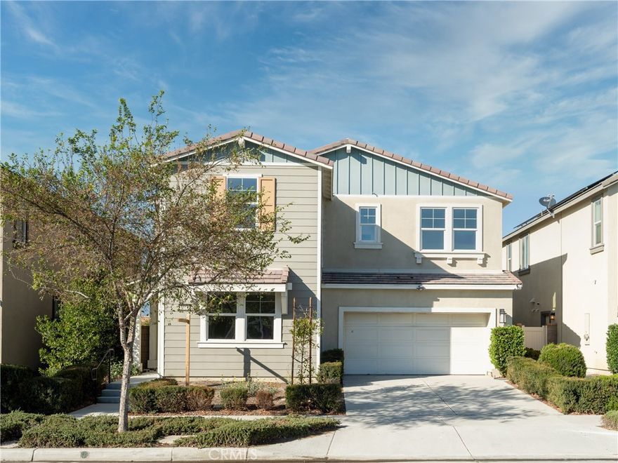 Beautiful 2020 Taylor Morrison home located in the highly desirable master-planned community of Park Place in Ontario Ranch. This nearly new home showcases a bright and modern open-concept design with functional living spaces throughout. Upon entry, you’re greeted by a private guest bedroom and full bathroom—perfect for visiting family or multi-generational living. The spacious great room flows seamlessly into the dining area and an upgraded island kitchen with a large walk-in pantry. Adjacent to the kitchen, a versatile flex room offers the ideal space for a home office, playroom, or entertainment area. The open gathering room extends to the covered California Room and landscaped backyard, creating the perfect indoor-outdoor flow for everyday living and entertaining. Upstairs features a cozy loft, ideal for movie nights or reading, along with a luxurious primary suite boasting oversized windows, a soaking tub, separate shower, dual sinks, and an expansive walk-in closet. Residents enjoy resort-style amenities including a pool, spa, gym, tennis and basketball courts, playground, dog park, and the impressive 14,500 sq.ft. Parkhouse clubhouse with theater and gourmet kitchen. Conveniently located near shopping, dining, parks, schools, and major freeways—this move-in ready home combines modern comfort with community lifestyle.