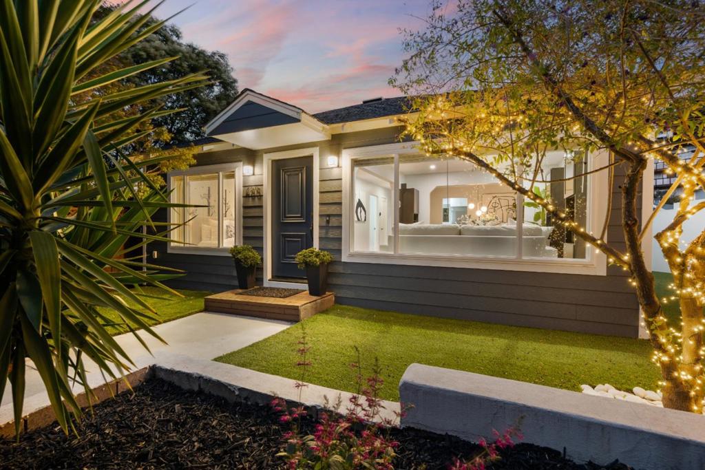 Upgraded Electrical Panel & Plumbing, plus a 3rd bedroom potential, this beautifully renovated corner-lot home is move-in ready and packed with thoughtful updates over $200K in total improvements. Modern upgrades include recessed lighting, a solar-ready electric panel, and fully updated plumbing for long-term peace of mind. The stylish kitchen features high-gloss white cabinetry, quartz countertops, and stainless steel appliances offering a sleek, functional space to cook and gather. 2 spacious bedrooms with flexibility to add a third, making it ideal for growing families or changing needs. Step outside to a private, low-maintenance backyard designed for both relaxation and play. The lush turf lawn, clean white cinder block walls, and inviting lounge area create a safe and welcoming space perfect for kids and families to enjoy the outdoors. A convenient storage unit adds function without compromising style. Ideally located just across from the elementary school and the free commuter shuttle to BART and Caltrain, with two community parks just blocks away this home delivers comfort, convenience, and value in one perfect package.