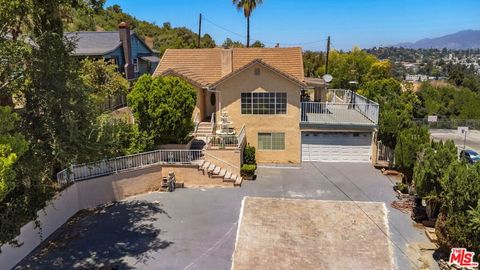 Photo of 5427 Bushnell Way, Los Angeles, CA 90042 (MLS # 25561125)