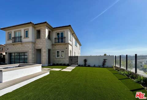 Photo of 20758 W Deer Grass Court, Porter Ranch, CA 91326 (MLS # 26867507)
