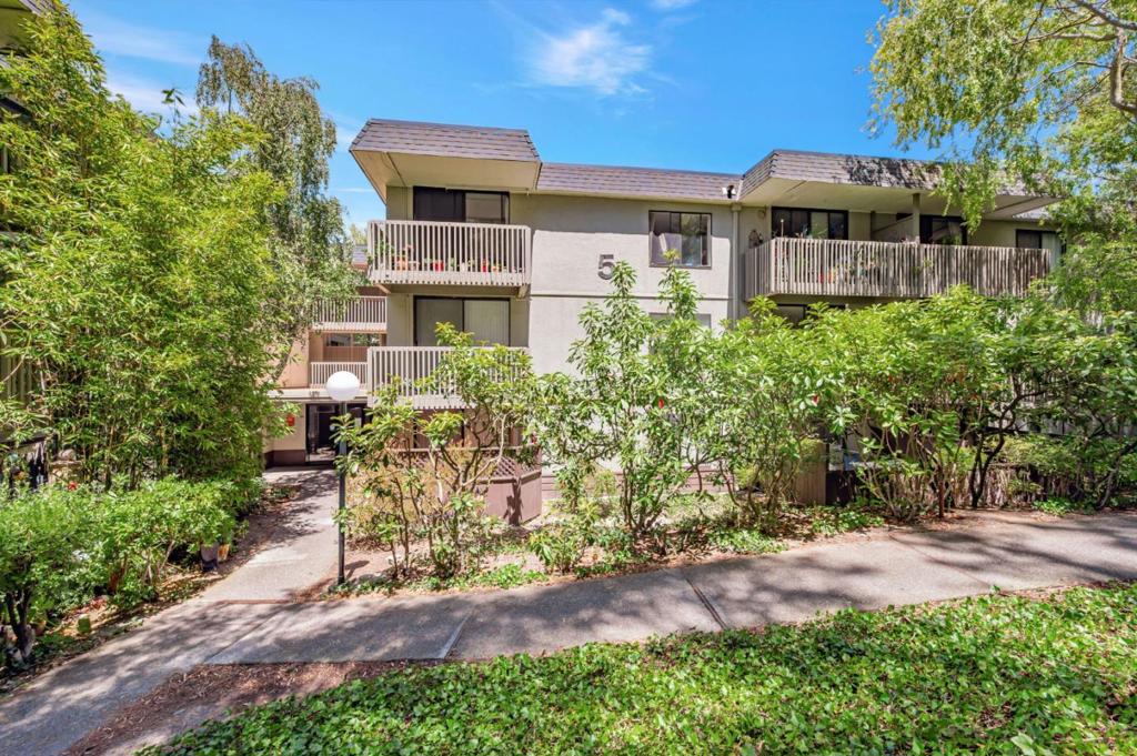Wonderful sun filled corner unit, 1,030 square feet featuring two bedrooms, two baths, large kitchen, dining room and living room. Freshly painted, and new flooring. The complex offers great amenities, three pools, two outdoor and one indoor, a Club House, exercise room and tennis courts. This unit is conveniently located to all amenities, but far enough away to ensure a quiet serene setting. This unit also has two assigned parking spaces a short distance from the unit, the elevator is just across the hall and the laundry is nearby.
