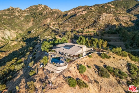 Photo of 31847 Hidden Highland Road, Agoura, CA 91301 (MLS # 26863865)