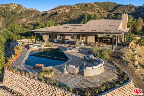 Photo of 31847 Hidden Highland Road, Agoura, CA 91301 (MLS # 26863865)
