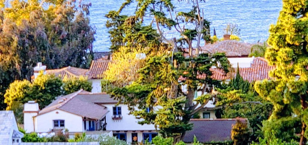 Welcome to 7728 Ludington Place – a one-of-a-kind, 5Bd/5.5Ba gated multi-structure La Jolla retreat with appx 4,146SqFt of total living space located in La Jolla Heights! Truly a rare find. This La Jolla estate offers privacy, scale, and character rarely found in today’s rental market. Set on a nearly 10,000 square foot lot, this serene Spanish Colonial Revival inspired compound features three separate living structures thoughtfully designed with two central courtyards, Saltillo-tiled walkways, outdoor fountains & lily pond w/ coy fish, multiple balconies, sprawling tiered backyard patio and outdoor seating areas surrounded by lush, mature greenery. This residence epitomizes La?Jolla’s 1920s charm and provides a perfect atmosphere for both relaxation and entertaining. A true sanctuary just minutes from La Jolla Shores, the Village, and UCSD. 7728 Ludington Place features a main residence, detached casita and a studio unit with patio located atop the large 2 car garage. The multi-structure layout is ideal for multi-generational living, remote professionals looking for dedicated office or studio space, or anyone seeking versatility, privacy, and space in one of San Diego’s most iconic neighborhoods. Welcome to 7728 Ludington Place – a one-of-a-kind, 5Bd/5.5Ba gated multi-structure La Jolla retreat with appx 4,146SqFt of total living space located in La Jolla Heights! Truly a rare find. This La Jolla estate offers privacy, scale, and character rarely found in today’s rental market. Set on a nearly 10,000 square foot lot, this serene Spanish Colonial Revival inspired compound features three separate living structures thoughtfully designed with two central courtyards, Saltillo-tiled walkways, outdoor fountains & lily pond w/ coy fish, multiple balconies, sprawling tiered backyard patio and outdoor seating areas surrounded by lush, mature greenery. This residence epitomizes La Jolla’s 1920s charm and provides a perfect atmosphere for both relaxation and entertaining. A true sanctuary just minutes from La Jolla Shores, the Village, and UCSD. 7728 Ludington Place features a main residence, detached casita and a studio unit with patio located atop the large 2 car garage. The multi-structure layout is ideal for multi-generational living, remote professionals looking for dedicated office or studio space, or anyone seeking versatility, privacy, and space in one of San Diego’s most iconic neighborhoods. MAIN RESIDENCE - 4Bd/3.5Ba (w/ additional optional bedroom), 3,562 SqFt The 3,562 SqFt main residence boasts 4 bedrooms and 3.5 baths with an additional optional bedroom, including a spacious downstairs primary suite, three upstairs bedrooms and a downstairs room with walkout DETACHED CASITA - Studio/1Ba Privately situated in the center of the property, this standalone casita offers incredible flexibility—ideal as a guest suite, art studio, home office, gym, or extended stay space. Though technically a studio, the layout includes a tucked-away alcove perfect for a bed, creating a sense of privacy while still maintaining the open-concept feel. The space features exposed beams, terracotta tile floors, and two sets of double French doors that open onto the beautifully landscaped courtyards and walkways —seamlessly blending indoor and outdoor living. The attached bathroom is wet-room style and ADA accessible, featuring a zero-threshold entry, handrails, built-in shower seating, and a ceiling-mounted curtain track to define the space. With thoughtful design and ground-level access, this flexible-use structure functions beautifully for a wide range of living, creative, or work-from-home needs. UNIT ABOVE GARAGE – Studio/1Ba Sitting above the garage and accessed via a private exterior staircase equipped with a rare ADA-friendly stair chair lift, this standalone studio offers a flexible living space with vaulted ceilings, exposed beams, and peaceful treetop views. The charming kitchenette is well-equipped with generous countertop spa...