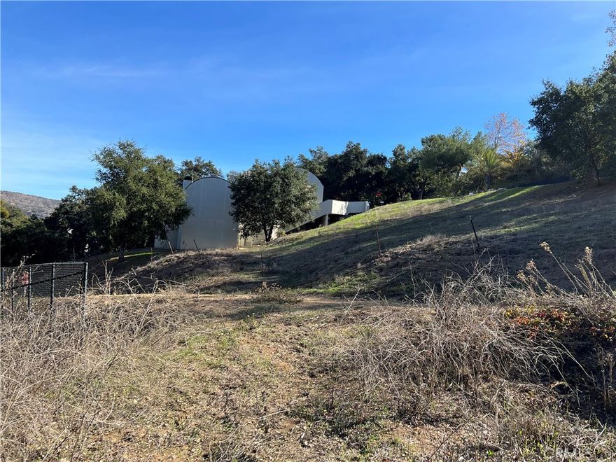 Suitable vacant land to built a house, mountain views from downhill.