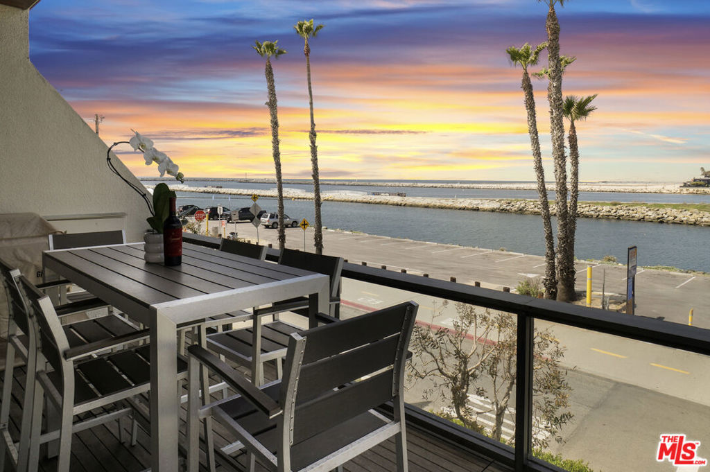Welcome to your new coastal haven, a stunning waterfront condo where modern luxury meets the beauty of nature. With breathtaking marina views and sweeping vistas of the main channel, this exquisite home offers an ever-changing canvas of water and sky. Natural sunlight pours in from every angle, creating a bright, airy atmosphere throughout. Watch yachts glide in and out of the harbor and enjoy views of the ocean and Point Dume in the distance, all from the comfort of your elegant living space. Located right on the renowned Marvin Braude Bike Trail, you can enjoy scenic rides or peaceful strolls along the ocean's edge, with endless views of the coast stretching out before you. This chic, sophisticated interior features sleek, high-end finishes throughout boasting custom walnut cabinets in bathrooms, custom marble sink in primary bedroom, and electric shades throughout, providing a truly modern living experience. Whether you're inside, appreciating the pulse of the city through your windows, or outside, soaking in the surrounding natural beauty, this condo is the epitome of coastal living at its finest. 3 bedrooms plus additional office room! Building also features an area pets. Don't miss the chance to call this exceptional property home.