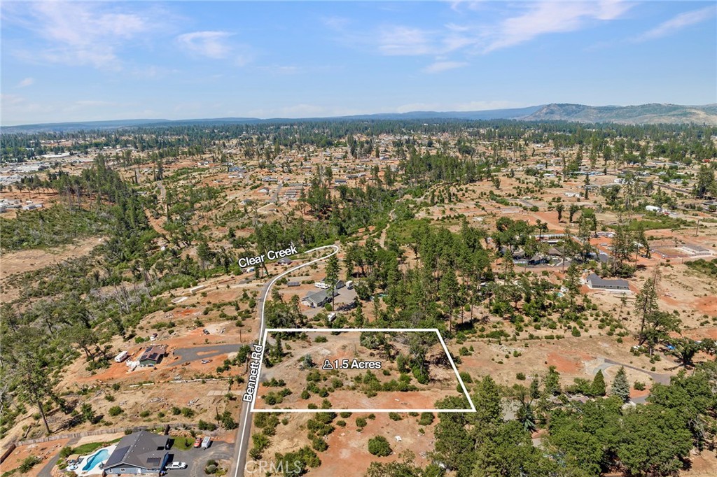 Fantastic Lower Paradise Location for this all usable 1.5 acre lot! Septic system was inspected 7/6/23 and Tank and Leach field passed, this system is a bedroom system.The property does have many trees that survived the camp fire. The previous home was 2,658 square feet with 4 bedrooms and 2 baths. The septic tank was installed in 2010 and is 1500 gallons. Condition unknown at this time. Currently good views of the Sutter Buttes! This property is zoned AR-1 Agriculture Residential offering many possibilities. A decent amount of chain link fence is still in place. There is also a R.V. carport cover and a chain link double gate in good shape. To view some of the potential uses go to https://www.townofparadise.com/planning/page/zoning-information.
