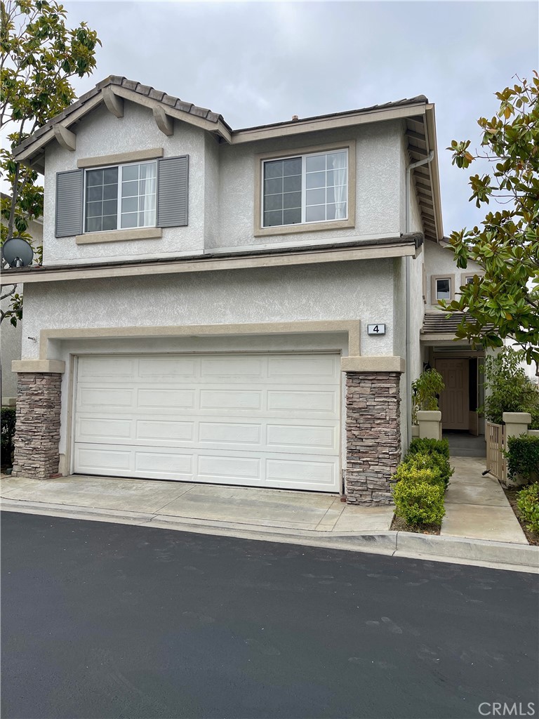 This beautifully updated 3-bedroom + loft home sits on a private lot with no exposure to busy streets. Conveniently located in a great Gated community of Cape Victoria in prime location of Aliso Viejo. The open-concept layout showcases stylish with charming & cozy fireplace in living area. All newly tiled & Laminated floorings throughout including the staircase. Beautifully & tastefully remodeled kitchen with new custom designed cabinetry and stainless steel appliances. All 3 renovated bathrooms with brand new vanities, sinks, faucets & toilets. Upstairs features all bedrooms, a versatile loft, and a convenient laundry area enclosed. All recess lightings throughout. New Ceiling fans in living room & dinning area. The 2-car garage with storage cabinets. Ideally located just steps from Oak Grove Elementary, Don Juan Avila Middle School, nearby parks, and minutes to shopping, dining, and freeway access. This is a rare leasing opportunity—schedule your tour today!