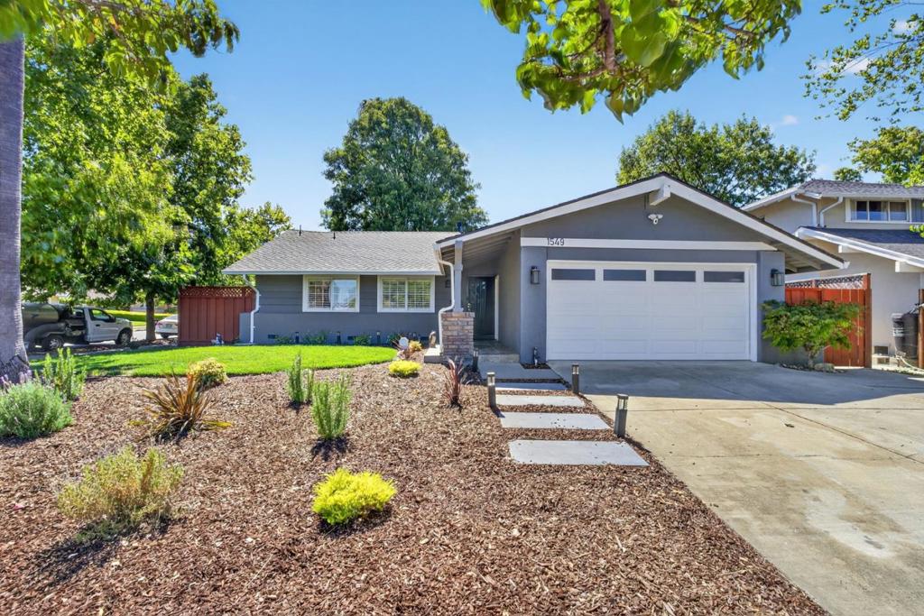 Welcome to 1549 Hilton Court! Situated on a desirable corner lot in West San Jose, this beautifully updated single-story home showcases true pride of ownership and offers an option for possible ADU. The manicured front lawn and inviting entryway set the tone for the beauty that lies within. Step inside to a sun-drenched interior featuring fresh paint, stylish flooring, recessed lighting, and an open layout that seamlessly connects the living and dining areas. The dining space opens to the backyard and connects effortlessly to the modern kitchen, which features quartz countertops, a full suite of appliances, abundant cabinetry, and a spacious breakfast bar overlooking the family room; perfect for entertaining. Down the hall, you will find a a full guest bath and three generously sized bedrooms, including the primary suite with a stunningly upgraded ensuite bathroom. Additional amenities include a private backyard with a large patio, an attached two-car garage with extra storage, and a prime location near shopping, parks, major highways, and the top-rated Moreland School District.