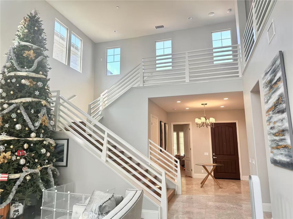 FULLY FURNISHED luxury single family house in the highly desirable Stonegate Community, walking distance to school, parks, swimming pools, trails and shopping center. This elegant 3888 square feet house offers an exceptional combination of modern design and high end finishes. As entering the house, you will be greeted by soaring ceilings, abundant natural light and open floor plan. This beautiful home features 5 bedrooms 5.5 bathrooms, and an upstairs loft. Two en-suite bedrooms are located on the first floor, including a primary suite and a private guest room. There are 3 additional spacious bedrooms with their own bathrooms, and an office/artistic loft upstairs. Outside, the well-manicured yard offers a tranquil space for relaxation or outdoor gatherings. This home comes with upgraded hard flooring, premium furniture, EV charging station and ready to move in!
Part of the Stonegate community with full access to all resort-inspired amenities including 7 parks, 4 pools & spas, outdoor kitchens, playgrounds, tennis/basketball courts, Jeffrey walking trails, and much more. Award-winning Irvine Unified School District includes Stonegate Elementary, Sierra Vista Middle School and Northwood High School. Enjoy being close to shopping at Woodbury Town Center and The Irvine Spectrum.
