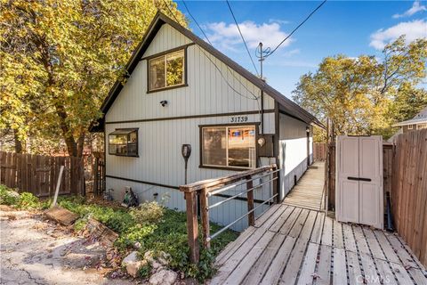 Photo of 31739 Panorama Drive, Running Springs, CA 92382 (MLS # IG25239811)