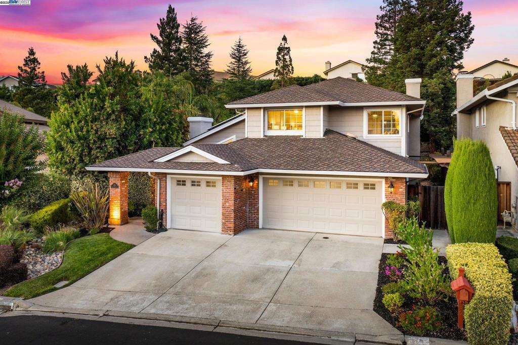 Nestled in the highly sought-after Canyon Crest community, this stunning two-level home offers 4 bedrooms, 3 bathrooms, and 2,824 sq. ft. of living space on a generous 14,800 sq. ft. lot. with a bedroom and full bath conveniently located on the main level. A dramatic foyer with soaring vaulted ceilings sets the tone for the inviting interior. The formal living room showcases a custom built-in wall unit with bookcases and storage surrounding the fireplace, while the adjacent dining room provides an elegant setting for gatherings—or the perfect spot for a grand piano. The gourmet kitchen features abundant cabinetry with pull-out drawers, eat-in kitchen, and seamless flow into the spacious family room with direct access to the backyard. Upstairs, the luxurious primary suite serves as a true retreat with a walk-in closet, dual vanities, soaking tub, shower, and a private balcony overlooking the backyard. Two additional bedrooms and a full bath complete the upper level. Step outside to your private backyard paradise with a sparkling pool and spa, a custom outdoor BBQ with fireplace, and a shaded seating area perfect for year-round entertaining. Energy-efficient owned solar adds exceptional value and savings. Easy access to 680, Costco, San Ramon City Center and top rated SR schools!