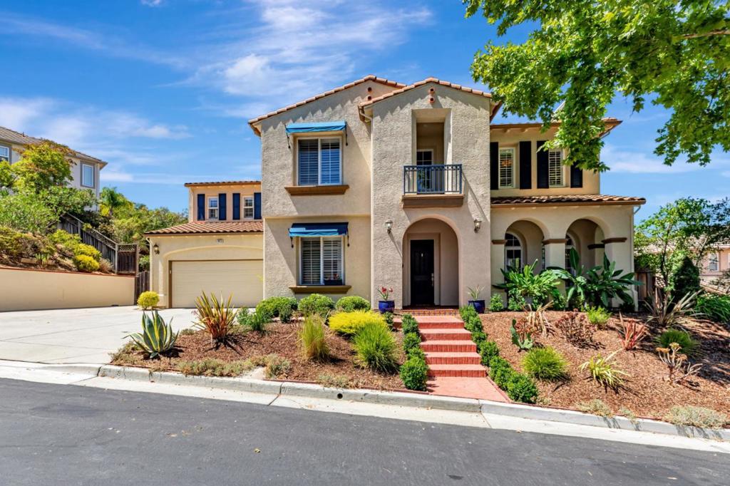 Welcome to your family retreat in the coveted Eagle Ridge gated community! This spacious 5-bedroom, 4.5-bath home invites you in with soaring ceilings and a sparkling chandelier and features an ideal layout for large or multigenerational families. Enjoy light-filled living spaces with an open gourmet kitchen (new stainless-steel appliances), breakfast nook, formal dining, and a spacious family room perfect for gatherings. The primary suite offers a remodeled spa-inspired bath and walk-in closet, while multiple en-suite bedrooms provide privacy and flexibility. A bonus space is ideal for homework or game nights. Step outside to a private backyard built for BBQs and play. Community amenities include a pool, tennis, pickleball, bocce, golf, scenic walking trails for you and your pet family, and community club house for children's birthday and extra large gatherings - all in a welcoming neighborhood with top Gilroy schools and easy Silicon Valley access.