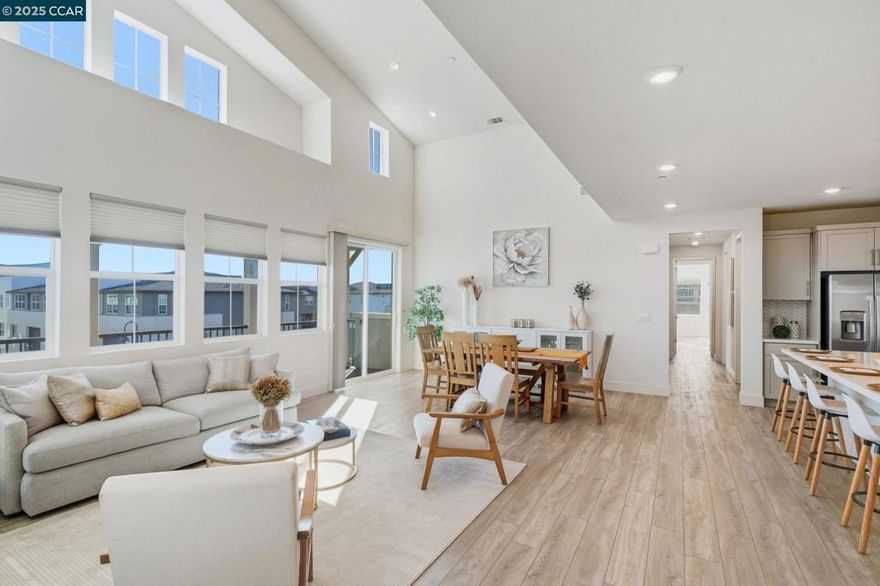 This stunning 3-bedroom,  2-bath luxurious townhome- style condo located in the highly desirable San Ramon Preserve offers the perfect combination of modern elegance and everyday convenience. The open -concept layout features soaring ceilings, abundant natural light, and updated finishes throughout. The gourmet kitchen is ideal for entertaining, showcasing sleek stainless-steel appliances, quartz countertops, walk in pantry, and ample cabinetry. All bedrooms are conveniently located on one level, including a spacious primary suite, with an ample walk-in closet and a spa-inspired bath featuring dual vanities. The spacious top-floor loft provides a flexible retreat for a home office, playroom, or media room. Smart home upgrades include EV charger pre-wire, Ring doorbell, smart thermostat, smart oven, and a WiFi range extender for seamless living. Residents enjoy resort-style amenities with HOA coverage that includes a sparkling pool, lounge with cozy fireplace, BBQ area, bocce court, exterior maintenance, and insurance for worry-free living. Additional city amenities—such as sports courts, playgrounds, and a dog park—are just steps away. Located within a top-rated school district, this home offers both luxury and lifestyle with the convenience of shopping & 680 freeway minutes away
