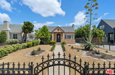 Photo of 1142 S Windsor Boulevard, Los Angeles, CA 90019 (MLS # 26839621)