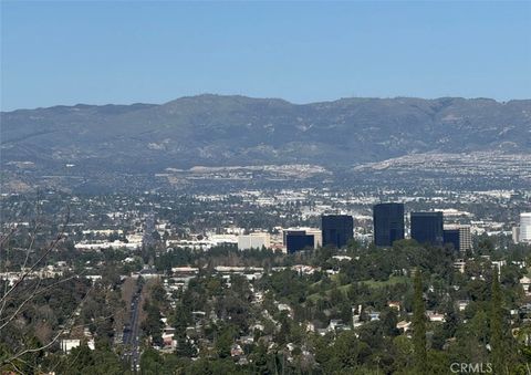 Photo of 3300 N Topanga Canyon Blvd, Woodland Hills, CA 91364 (MLS # CV26011442)