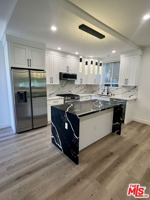 Photo of 8854 Cashio Street #ADU, Los Angeles, CA 90035 (MLS # 26659143)