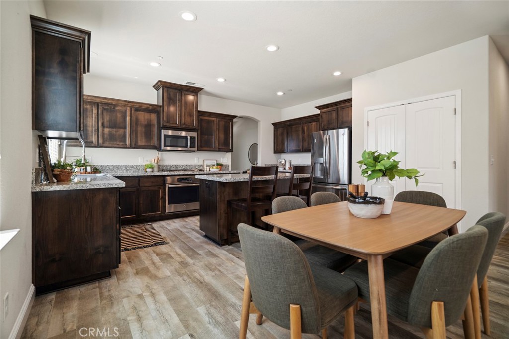 Welcome to 3224 Freshwater Creek, a beautiful home in the desirable Sycamore Creek community! This 1,543 sq. ft. home offers 3 bedrooms, 2 bathrooms, and a dedicated office right off the entry, perfect for working from home, hobbies, or even a cozy library nook. Designed for today’s lifestyle, the open-concept living space brings everyone together. The kitchen is the heart of the home, featuring granite countertops, a built-in gas range, stainless steel appliances, an over-the-range microwave, and a large pantry with plenty of storage for all your essentials. Natural light pours through the windows, highlighting the warm tones of the cabinetry and the spacious dining and living areas. Whether you’re hosting family dinners, holiday gatherings, or quiet nights in, this layout is ideal for both entertaining and everyday comfort. The primary suite is a private retreat, complete with direct access to the backyard patio, dual sinks set in granite, a walk-in shower, a separate toilet closet, and a large walk-in closet that makes getting ready a breeze. For added comfort, blackout blinds have been installed in the bedroom, perfect for restful sleep, and a shutter in the bathroom provides extra privacy while still letting in natural light. Down the hallway, you’ll find two well-appointed bedrooms, a full guest bathroom, and a convenient indoor laundry room. Step outside and you’ll find a backyard designed for both relaxation and low-maintenance enjoyment. The covered patio is the perfect spot for your morning coffee or evening BBQ, while the beautifully landscaped space is ready for gatherings or a quiet retreat. Additional highlights include 9’ ceilings and tall baseboards throughout for an airy, spacious feel, and an OWNED solar system installed in 2019 to help keep energy costs low. And the location? It’s hard to beat, set near a community nature preserve and neighborhood trails, plus just minutes from Lower Bidwell Park and Wildwood Park, where endless hiking, biking, and outdoor recreation await. You’ll also appreciate being conveniently close to coffee shops, restaurants, a gym, Marigold Elementary, Pleasant Valley High, and plenty of shopping and dining options. 3224 Freshwater Creek is the perfect blend of function, style, and convenience. All that’s left to do is move in and make it yours!