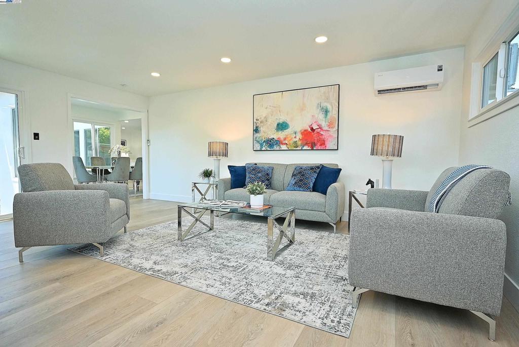 WOWWWWWW... Step into this beautifully updated home, where modern elegance meets everyday comfort! The kitchen is a chef's dream, featuring slab counters, ample cabinetry, and stainless steel appliances, including a coveted gas stove. The open floor plan is bathed in natural light, complemented by Vinyl floors throughout, making maintenance a breeze. Whether you're hosting a gathering or enjoying a quiet evening, this home is perfect for both indoor and outdoor entertaining. The backyard is a private oasis with a large concrete patio, artificial turf for low-maintenance living, and side yard access for added convenience. This 3-bedroom, 2-bath gem is nestled in the desirable neighborhood. The primary bedroom offers a serene retreat with an attached bath, while the bright and airy family room opens to a spacious backyard, ideal for outdoor barbecues or cozy nights around the fire pit. With a newer roof this home is move-in ready. Located just minutes from downtown Livermore, shopping, and easy freeway access, this stunning home is not to be missed! ALL WORK DONE WITH PERMITS!!!