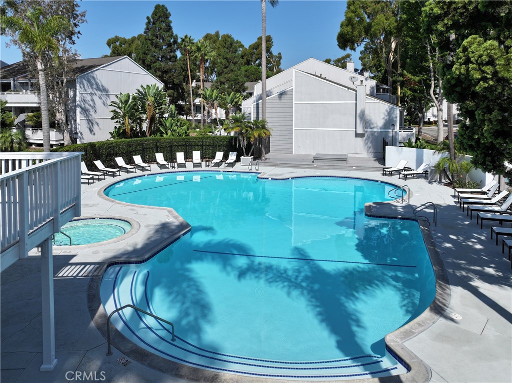 Experience a beach-close resort lifestyle in the highly desirable community of Newport Crest in this 3 bedroom/2.5 bath townhome. This home offers a dedicated dining area, wood floors in the kitchen, entrance way and dining room, remodeled kitchen with a 5-burner gas stove and stainless steel appliances, large primary room with its own private balcony with peek-a-boo ocean views, the living room has vaulted ceilings with a gas fireplace creating that warm comfortable and inviting feeling. There's a deck off the living room that allows outdoor living and savoring peaceful refreshing ocean breezes. The spacious 2-car garage allows for both parking and storage and has a dedicated laundry area with a washer and dryer included. This townhome offers premium location with steps to Sunset Ridge Park, moments to beautiful pristine beaches, world-class 5-star gourmet restaurants, famous and vibrant Balboa Peninsula, charming Balboa Island, upscale shopping at Fashion Island Shopping Center, Trader Joes, Hoag Hospital, award-winning schools, etc. Enjoy a short walk to the community heated sparking pool and spa and barbecue area or take advantage of the lighted tennis courts. Life just can't get better than this!