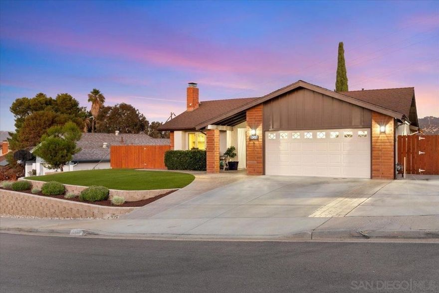 Absolutely immaculate 3 bed/2 bath hilltop home in cul-de-sac location with city lights & mountain views! Highly upgraded throughout. Sellers have taken exceptional care of this canyon home! Remodeled kitchen & bathrooms, flooring, retextured walls & ceilings, paint inside & out, new fascia, rain-gutters, upgraded retaining walls, turf & fencing. A/C & central heat plus gas fireplace w/ new insert in living room. Large primary bedroom offers two closets, one walk-in & one adjacent to bathroom. EZ care landscape & hardscape, spacious outdoor permanent storage building, huge 2 car garage. Boat, trailer and/or potential RV parking space. No through traffic, tiered lots in area make this home a very peaceful, private retreat. There is a main living room in front of home plus an extra flex-space near dining which can be used as a den, game area or a more formal dining room. Back yard is perfect for entertaining with BBQ & three seating areas, two of which overlook the canyon.  Spend evenings out by the fire-pit under the stars & enjoy the views or watch your favorite sports under the covered patio. This is the home you've been waiting for. Move right in and LOVE where you live!