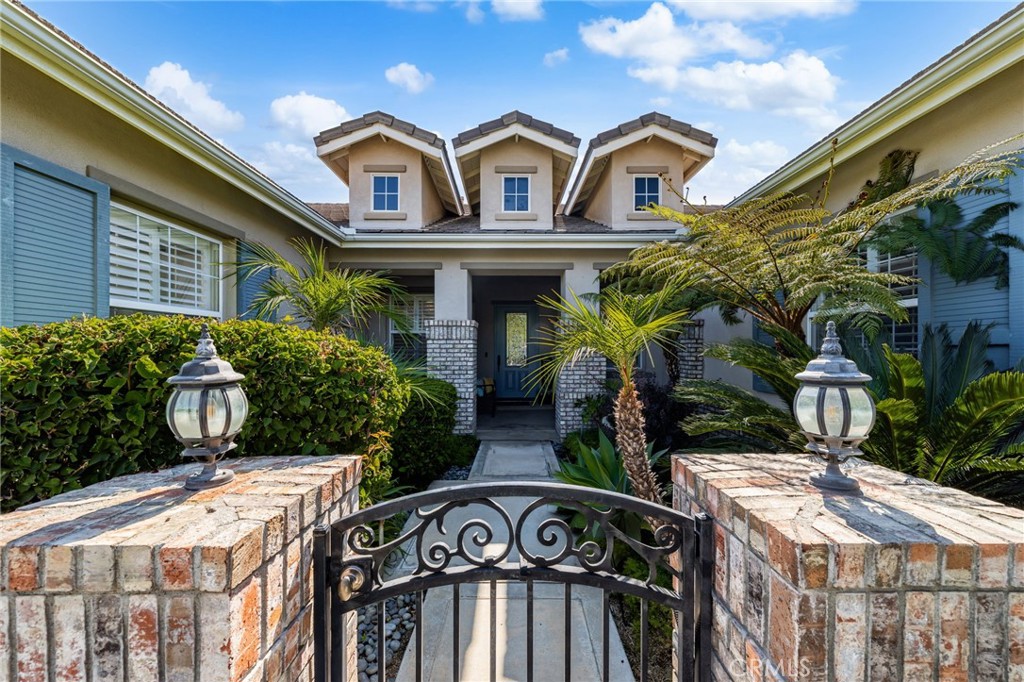 Welcome to 8067 Terraza Court — a phenomenal single-story retreat located in the prestigious gated community of Rancho Valencia. If you’ve been searching for a fully upgraded single-story pool home with unmatched privacy, style, and function, your search ends here.
Perfectly situated on an oversized ½-acre cul-de-sac lot, this home greets you with stunning curb appeal and a spacious rectangular layout that maximizes views and usability. Step inside to a bright, open floor plan highlighted by natural engineered hardwood floors, upgraded baseboards, crown molding, high ceilings, shutters, and expansive windows that frame the picturesque backyard from the moment you enter.
Offering 4 bedrooms, 3 bathrooms, and a large private home office with its own entrance and A/C, this residence blends luxury and flexibility. The chef’s kitchen is fully remodeled with hardwood cabinetry, quartz countertops, stainless steel appliances, a farmhouse sink, pendant lighting, floating shelves, and a striking full-wall decorative tile backsplash — all with uninterrupted sightlines to the sparkling backyard pool and waterfall.
The primary suite, thoughtfully positioned for privacy, features panoramic views, a spa-inspired ensuite with a walk-in shower, soaking tub, and a custom-organized walk-in closet. Two additional bedrooms share a Jack-and-Jill bathroom and feature closet organization systems, complemented by a dedicated homework or study nook area. A fourth bedroom and a nearby three-quarter bath create the perfect space for guests, separate from the family.
Additional upgrades include a new HVAC system, a new water heater, an upgraded laundry room with custom cabinetry and a wine fridge, and an epoxy-finished garage with enhanced lighting. Outdoors, you’ll find double full-wall sliders for a seamless indoor-outdoor flow, a huge covered patio, a standalone casita with fan and lighting, a sport court, and multiple producing fruit trees — all backing to a peaceful, active orange grove for ultimate privacy. There’s also ample RV parking.
Homes like this in Rancho Valencia are rare. Don’t miss your chance to own this extraordinary property — schedule your private tour today!