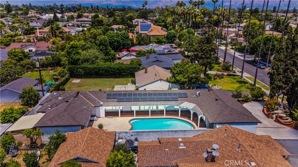 One story home located in North San Gabriel only a few blocks south of San Marino on a wide and palm tree lined road. A vibrant koi pond in front of the house with a cascading waterfall with lots of fishes creates a tranquil and visually appealing focal point. The circular driveway enhanced curb appeal and increase plenty of parking spaces. It also adds a touch of elegance to the house. Once you step in, the sparkling pool view will catch your eyes, you can see the view all around the house. The sliding doors with take you to the wrap around Spanish style patio, you can jump in and out the pool all day long.
The main house features 4 bedrooms 3.5 baths, there is a permitted ADU with 2 bedroom 1 bath and kitchen.
Do not miss this rare opportunity.