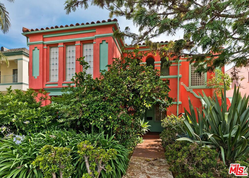 Charming Spanish-style duplex located in one of LA's most coveted neighborhoods. Each of the two units offers 3 bedrooms and 2 bathrooms. This property is also being sold with fully approved plans for a stylish remodel of the existing duplex plus the addition of a new, detached two-story ADU featuring 2 bedrooms and 2 bathrooms ideal for extended family, guests, or rental income. Situated just steps from the Grove, the Original Farmer's Market, Trader Joe's, and Whole Foods, this is an unbeatable location surrounded by top-tier retail, dining, and transit options. Includes two 2-car garages. The lower unit is currently vacant and easy to show. The upper unit is tenant-occupied and may be shown upon acceptance of an offer. Please do not disturb the tenants.