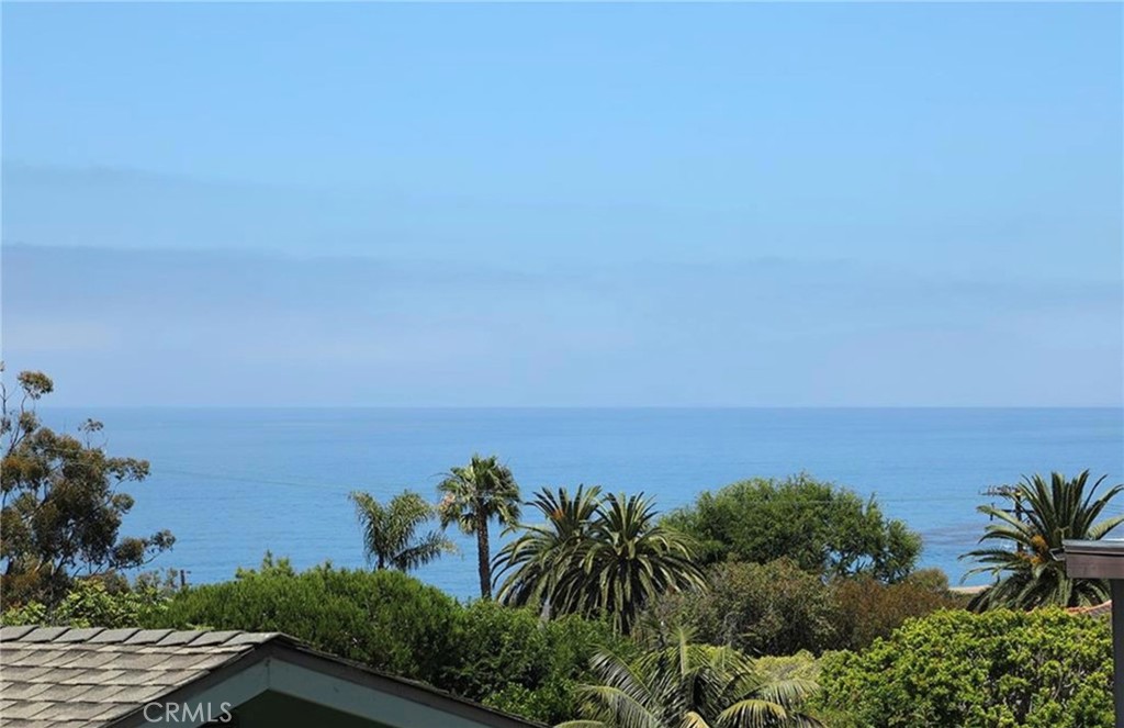 Prime woods cove location with tranquil ocean and sunset views. Close to beaches & town yet set away on a quiet street. Discover the allure of coastal living at 394 Moss Street, Laguna Beach. Nestled in the sought-after Woods Cove location, this 3-bedroom, 2.5-bathroom home offers comfortable living spaces on a generous 6250 square foot lot with possible room for expansion or ADU. Enjoy breathtaking ocean and sunset views from the comfort of your own home. Step inside to find a newly renovated kitchen and fresh paint, adding a modern touch to the interior. The upper level features 2 bedrooms, 1.5 bathrooms, and a spacious living room with vaulted ceilings and a grand fireplace. The living spaces opens to an ocean view deck, while the property also offers inviting outdoor spaces, including a patio and yard. The lower level studio with a separate entrance, bath, fireplace, and kitchenette provides versatility and potential for various living arrangements. Located on a quiet street, this home offers the perfect blend of coastal serenity and accessibility to beaches and town. Embrace the coastal lifestyle and make this exceptional property your own.